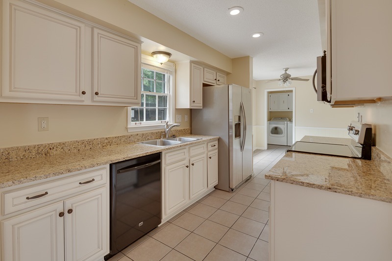 1967 Corbin Road Germantown, TN 38139 - Photo 4 of 25 Spectacular granite and new cabinets can be found in this wonderful kitchen.