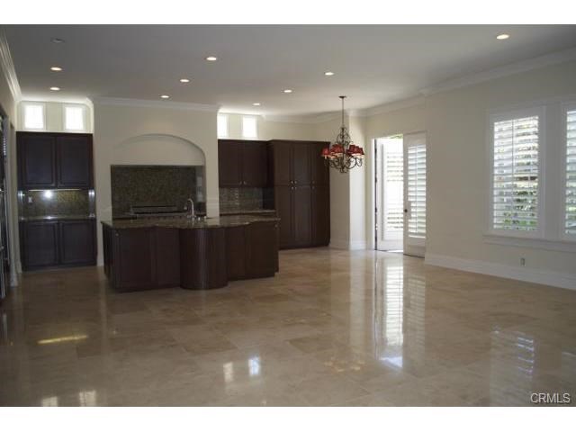 29 Marble Sands Newport Beach, CA 92660 - Photo 2 of 5 Spacious kitchen with stainless steel built-in appliances. Casual dining are in the kitchen/great room or at the island.