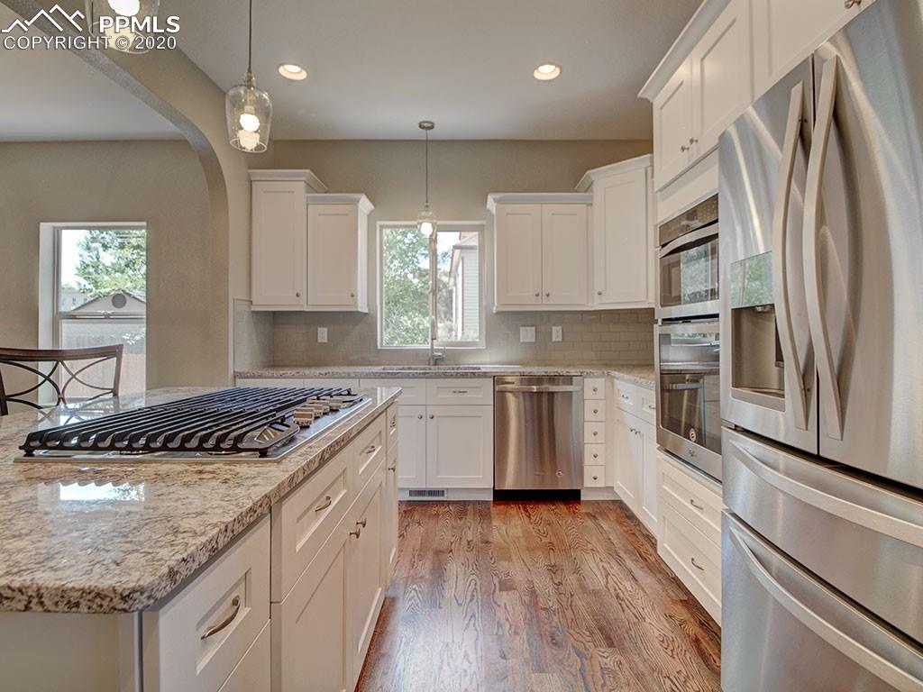 208 Custer Avenue Colorado Springs, CO 80903 - Photo 10 of 36 Open and airy feel to the entire main level