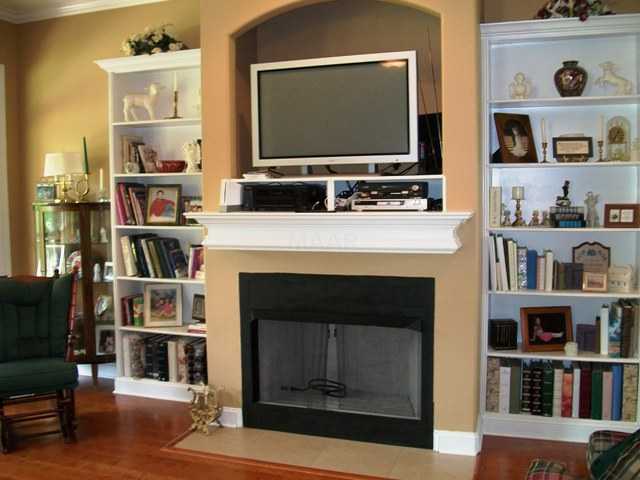 1270 Cherry Road Eads, TN 38028 - Photo 2 of 12 Lovely built-ins, gas fireplace and wood floors.