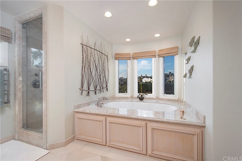 23 Emerald Glen Laguna Niguel, CA 92677 - Photo 34 of 56 Spa tub in master overlooking backyard