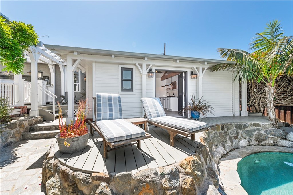 435 Agate Street Laguna Beach, CA 92651 - Photo 23 of 29 Guest house with french doors opening to pool.