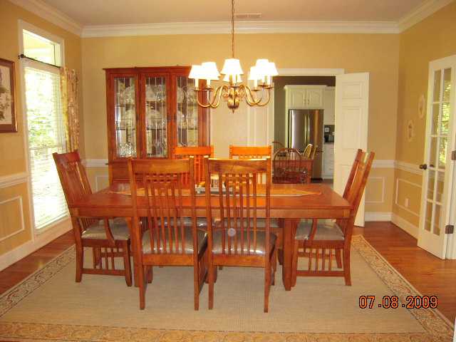 232 Wiseman Road Eads, TN 38028 - Photo 4 of 12 Dining room has ample room for seating everyone in the family. Windows overlook front porch and front yard.