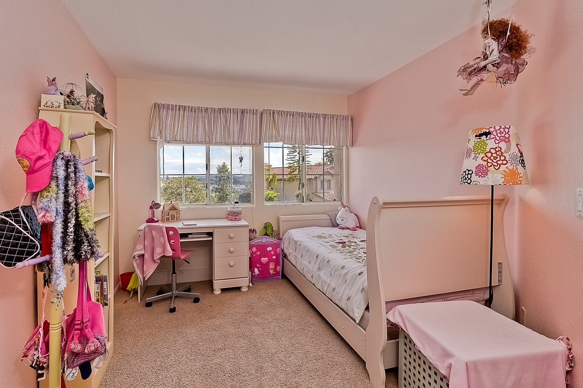 2382 Terraza Ribera Carlsbad, CA 92009 - Photo 18 of 25 4th bedroom has a "hidden" playroom off it, perfect for doll houses.