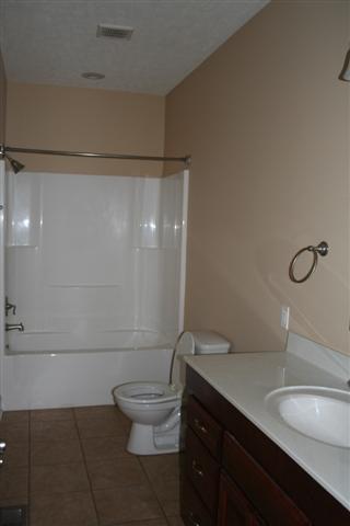 1212 Webb Road Lewisburg, TN 37091 - Photo 18 of 30 ONE OF 3 FULL BATHS LOCATED DOWNSTAIRS ON MAIN LEVEL. ALL BATHS HAVE CHERRY CABINETS AND TILE FLOORS.