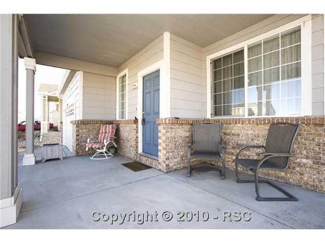 7807 Coffee Road Peyton, CO 80831 - Photo 15 of 15 Front porch.