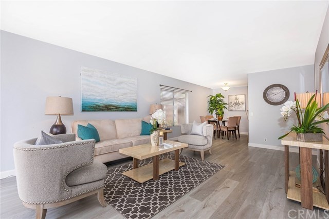 2284 Juniper Road Tustin, CA 92780 - Photo 1 of 1 New wood-style floors and scraped ceilings are just a few of the upgrades in this home!