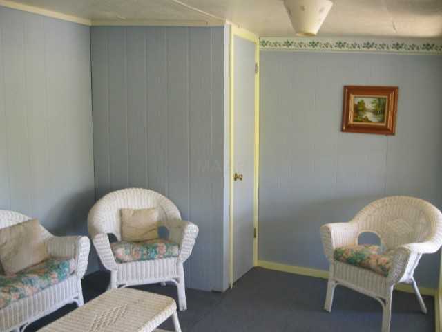 59 Chisholm Lake Spur Road Ripley, TN 38063 - Photo 11 of 12 Sunroom could also be used as 3rd bedroom!