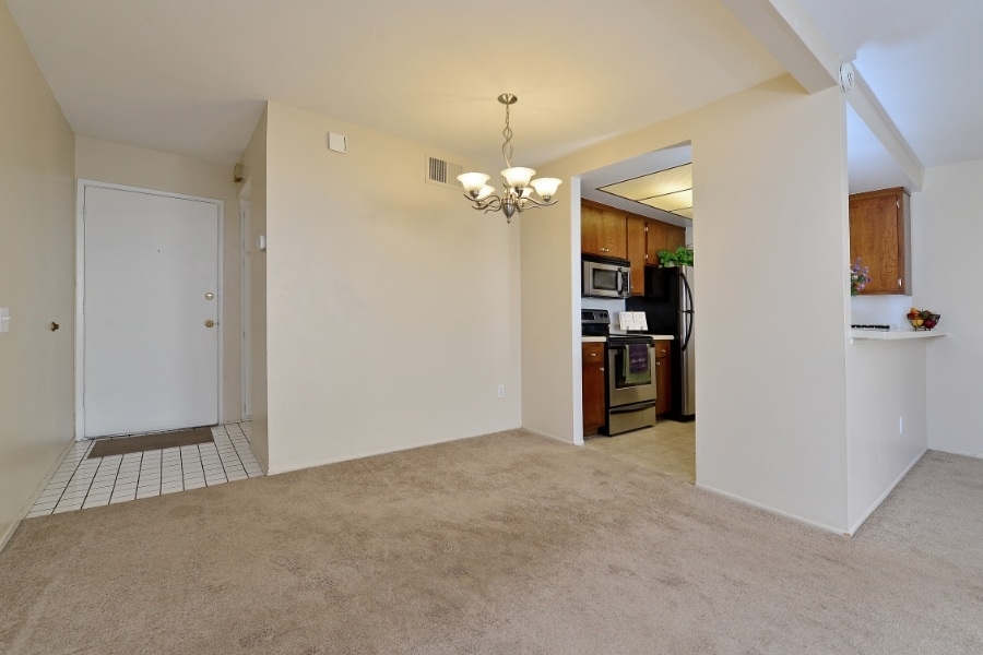 5989 Rancho Mission Road, Unit 105 San Diego, CA 92108 - Photo 3 of 23 Located close to kitchen!