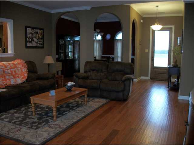 2023 Robert Johnson Road Covington, TN 38019 - Photo 6 of 20 Wonderful warm 5" hickory floors and a fireplace?! Yes!