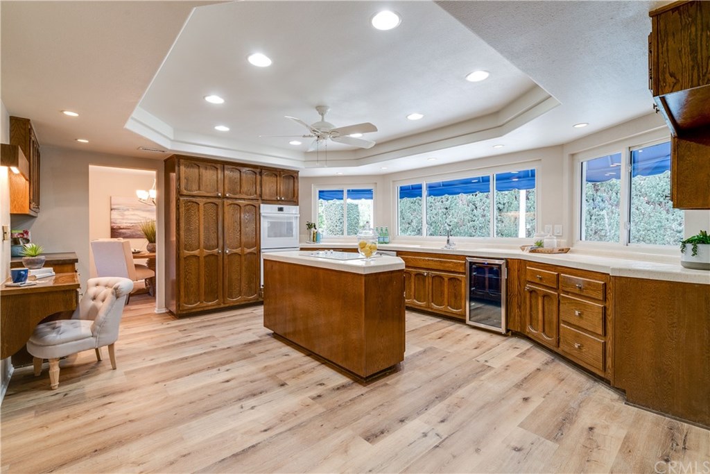 338 Purdy Avenue Placentia, CA 92870 - Photo 8 of 34 Meal planning desk, abundant cabinets and a pass through bar to the backyard