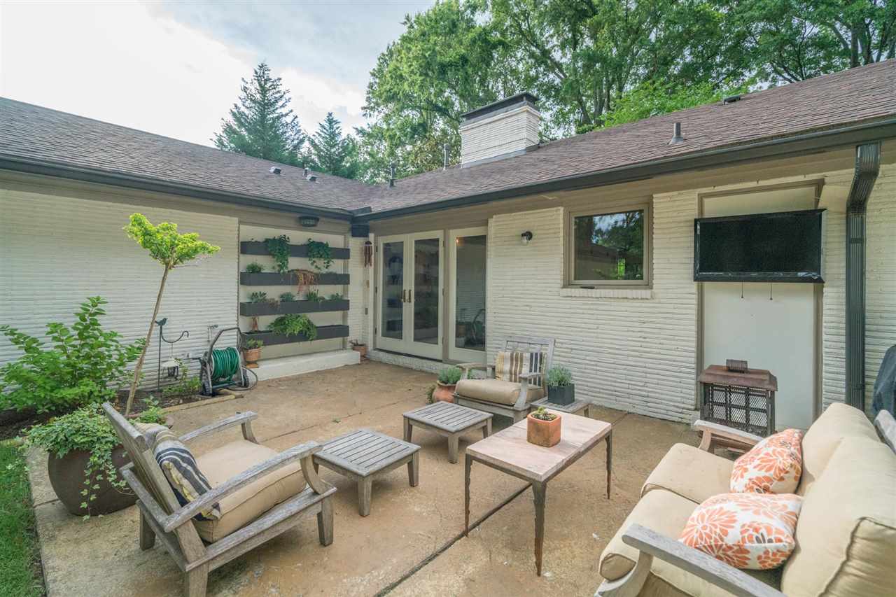 4451 Chickasaw Road Memphis, TN 38117 - Photo 9 of 23 Overlooks acre backyard. Ideal for a pool or to feel like you are just on a retreat.