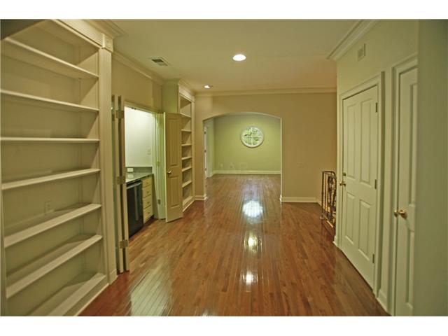 175 Waring Road Memphis, TN 38117 - Photo 11 of 12 Upstairs landing with wet bar and built-ins offers flexible space for family and entertaining.