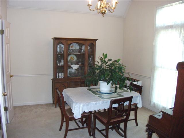 484 Fletcher Road Collierville, TN 38017 - Photo 5 of 11 Fromal Dinng Room with great wall space.