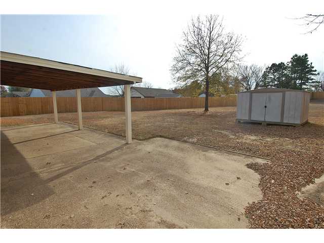 9843 Riggan Drive Olive Branch, MS 38654 - Photo 9 of 12 Covered Patio & Storage Building
