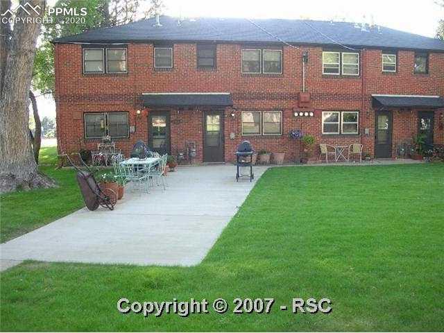 2483 Paseo Road Colorado Springs, CO 80907 - Photo 7 of 10 Large shared patio in rear of home