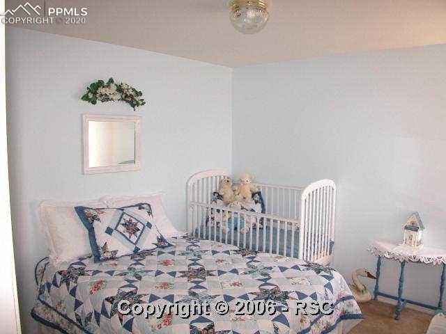 3835 Strawberry Field Grove, Unit H Colorado Springs, CO 80906 - Photo 5 of 8 2nd Bedroom