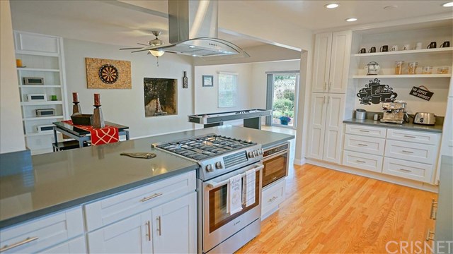 16809 Tupper Street Northridge, CA 91343 - Photo 8 of 19 Open kitchen to dining and family room area