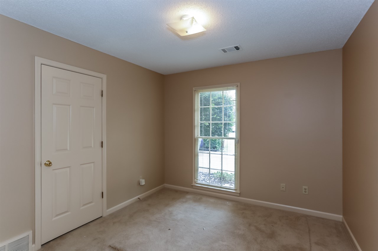8516 Buckhurst Road Memphis, TN 38016 - Photo 16 of 25 This home offers 3 additional bedrooms, each offering plush carpeting and fresh neutral paint.