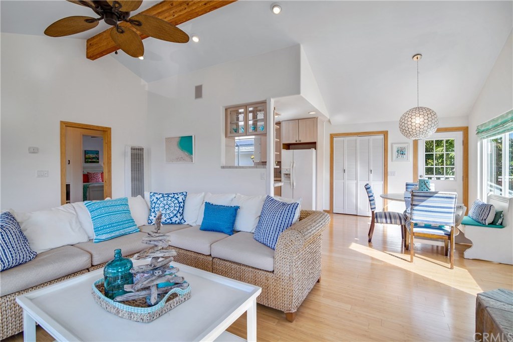 Adorable Light and Bright Beach Cottage with Fresh Paint, Volume Ceilings, and Wood Floors