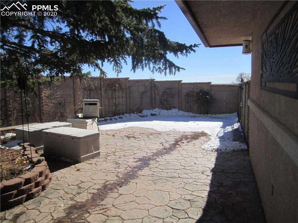 23455 Murphy Road Calhan, CO 80808 - Photo 22 of 35 Enclosed 54 x 20 stamped concrete patio