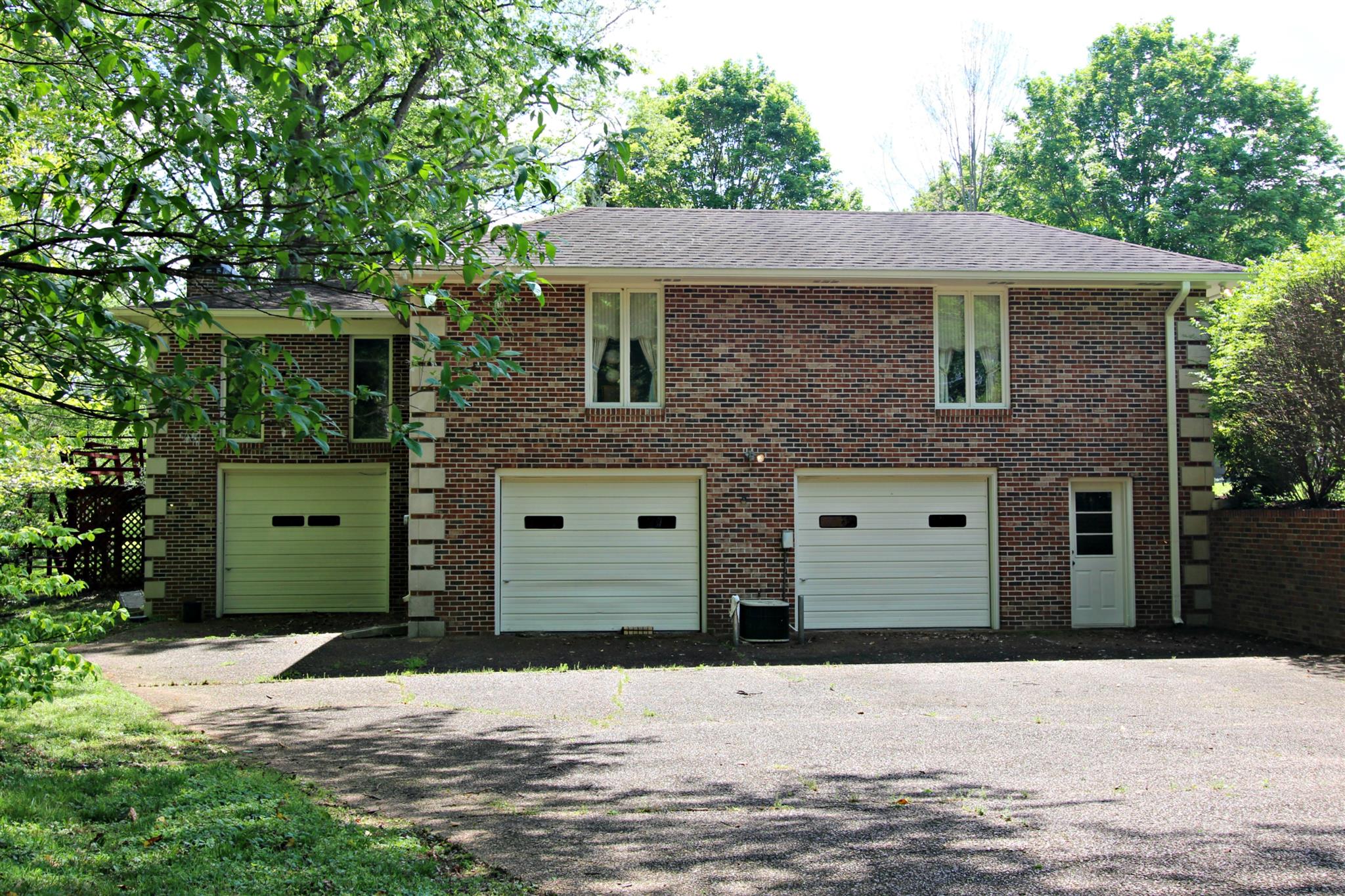300 Kippsford Pond Road Columbia, TN 38401 - Photo 8 of 36 Double garage is extremely deep and has extra bay. Inside is large enough for storage, workshop or other possibilities.