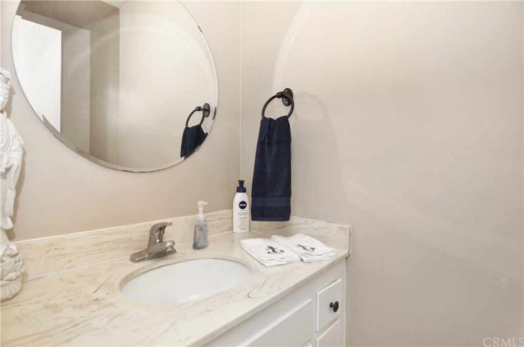 253 17th Street Seal Beach, CA 90740 - Photo 23 of 36 Guest, half bath sink with adjacent toilet