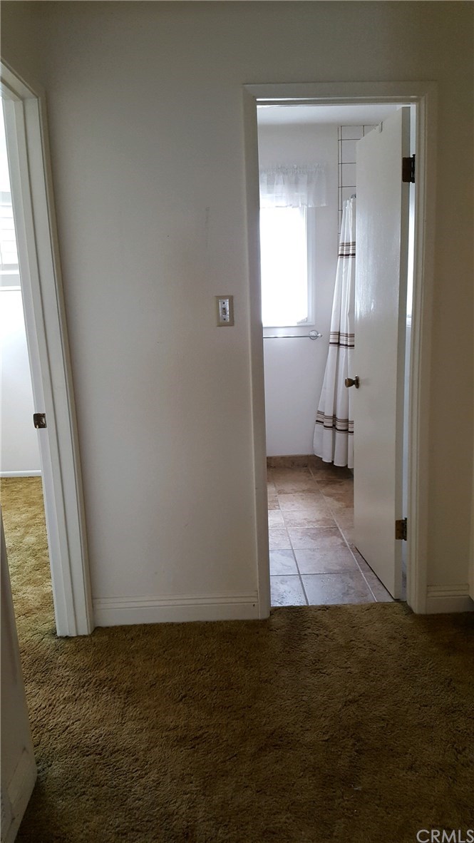 15744 Marlinton Drive Whittier, CA 90604 - Photo 7 of 52 Standing in hall outside front bedroom looking at full bathroom