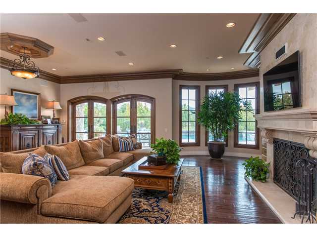 14790 El Rodeo Court Rancho Santa Fe, CA 92067 - Photo 6 of 25 Family room opening to the patio