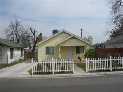 616 R Street Bakersfield, CA 93304 - Photo 1 of 14 Darling exterior elevation with cute white picket fence.