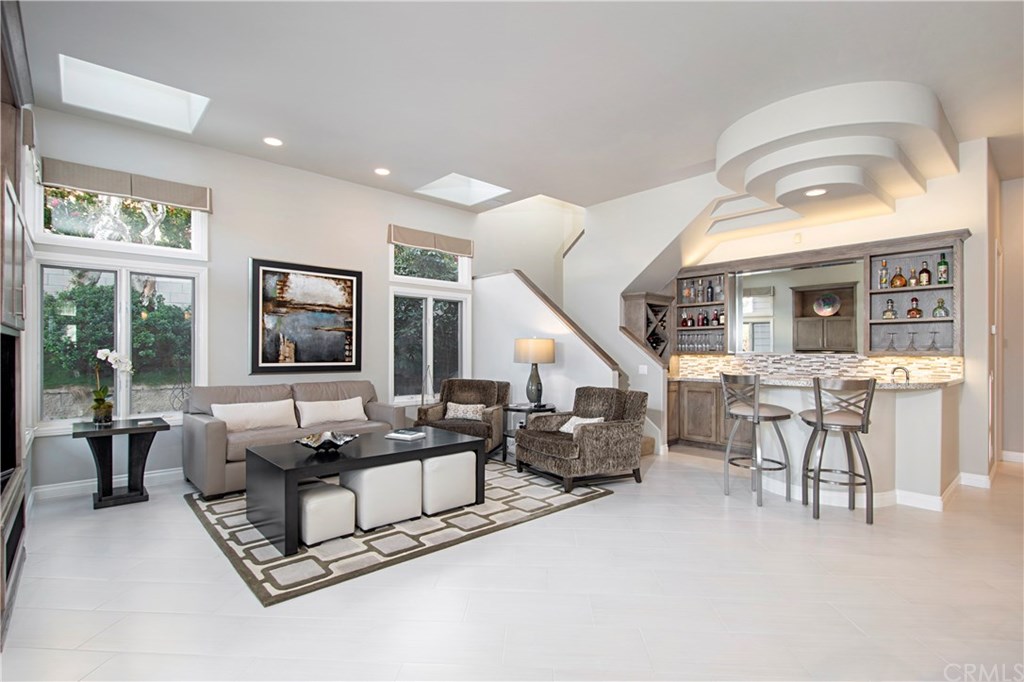 23 Emerald Glen Laguna Niguel, CA 92677 - Photo 18 of 56 Family room showing rear staircase and wet bar