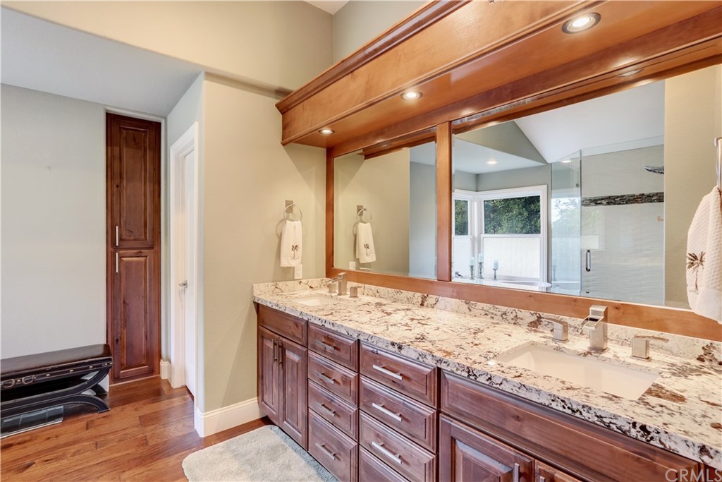 6 Via Colorso San Clemente, CA 92672 - Photo 14 of 32 Master bathroom includes private toilet room, dual sinks, granite countertops, beautiful wood cabinetry!