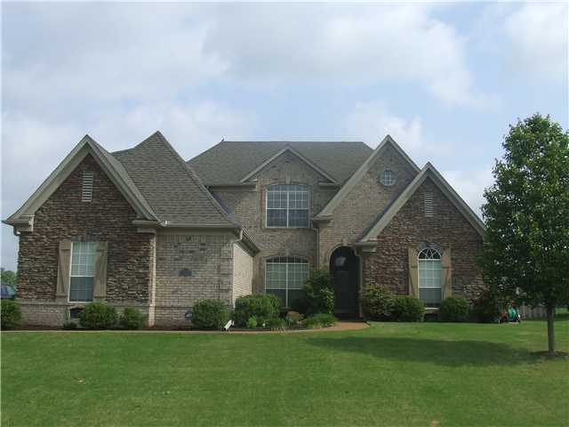 6184 Piney Bluff Road Bartlett, TN 38135 - Photo 1 of 12 .35 Acre 4BR/3BA/3 Car Garage in Bartlett! Decorative custom stack stone on each end of Exterior Front!