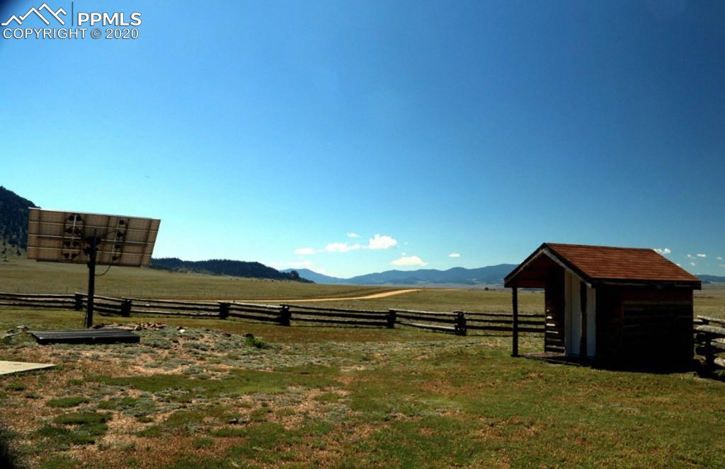 3545 High Chaparral Road Lake George, CO 80827 - Photo 17 of 26 Solar panel and playhouse