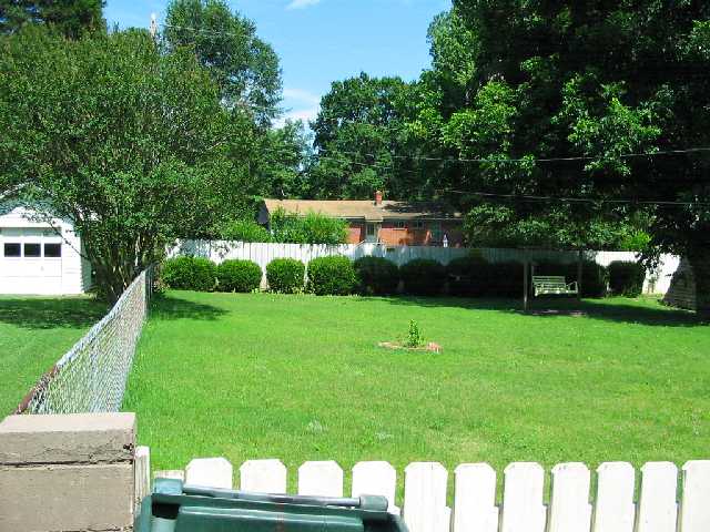 5300 Virgil Road Bartlett, TN 38134 - Photo 4 of 9 LEFT SIDE OF BACK YARD HAS PLENTY OF ROOM TO BUILD A GARAGE AND/OR DRIVE BACK FOR BOAT ETC