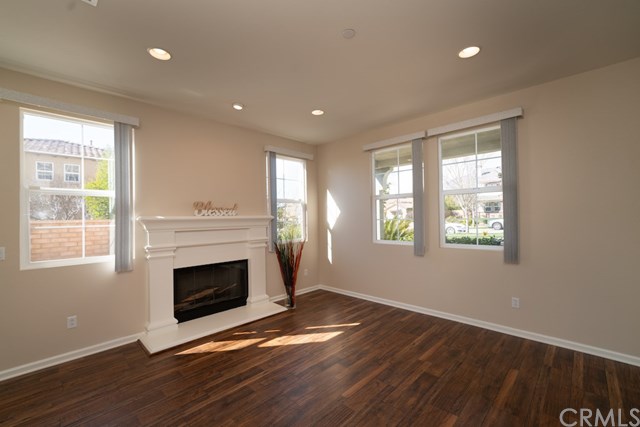 5473 Stoneview Road Rancho Cucamonga, CA 91739 - Photo 5 of 56 Formal living room with fireplace