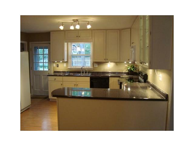 New granite, some cabinets, under cabinet lighting and wait till you see the pantry!  The window over the sink looks into a gorgeous back yard.