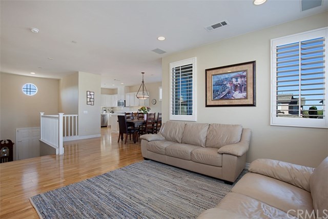 605 Corte Calmo San Clemente, CA 92673 - Photo 6 of 27 View from living room towards the dining area and the kitchen.