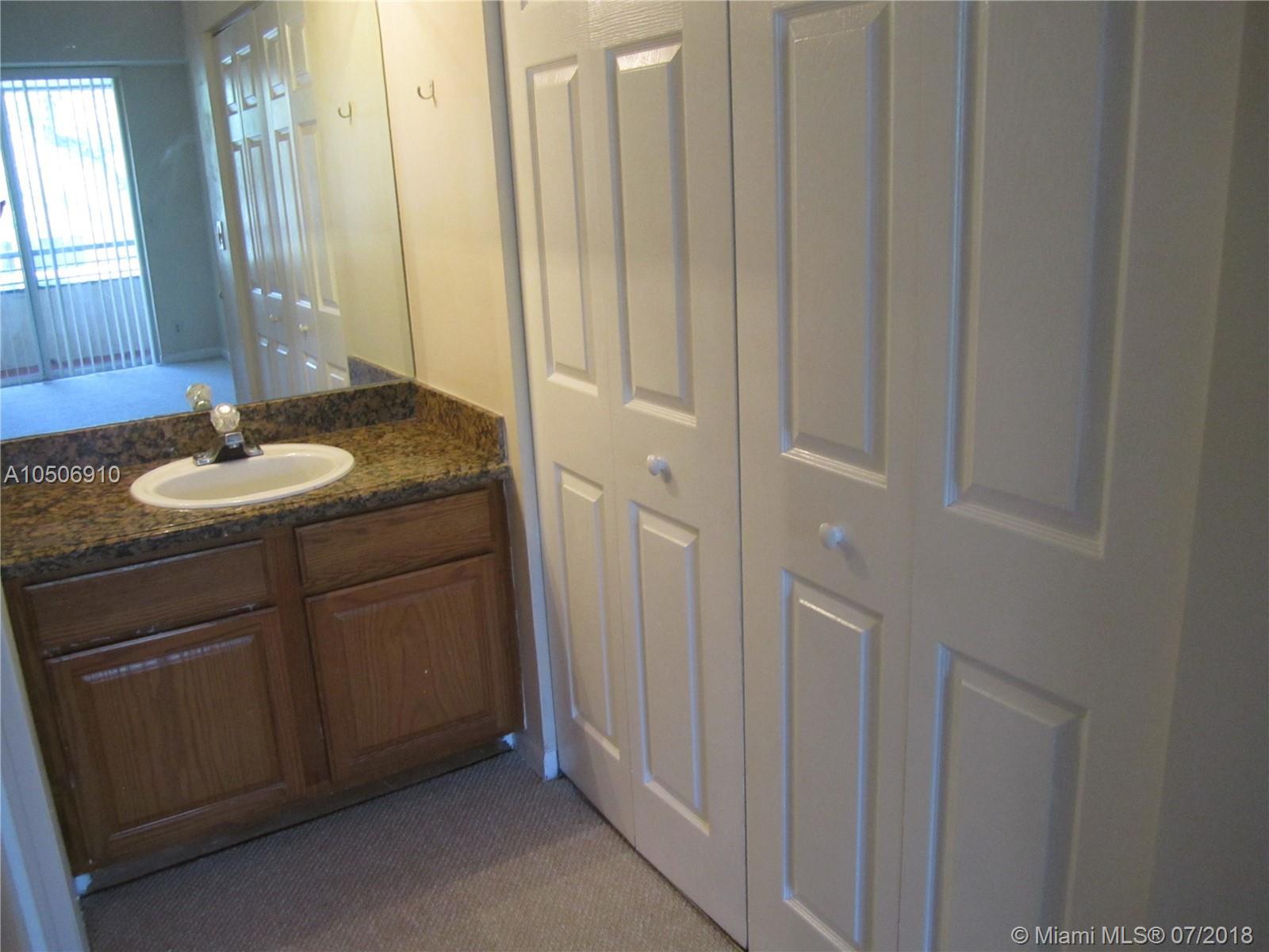 831 Lyons Road, Unit 23205 Coconut Creek, FL 33063 - Photo 5 of 21