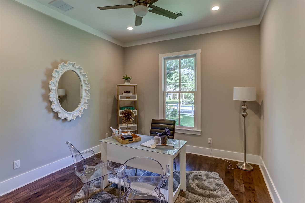 4635 Princeton Road Memphis, TN 38117 - Photo 15 of 25 This bedroom can also work as the perfect office space! Hardwood floors, hunter fan with remote, double closet. Located next to 2nd full bath down!