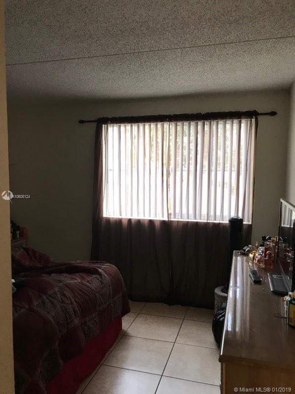6065 Northwest 186th Street, Unit 207 Hialeah, FL 33015 - Photo 5 of 8
