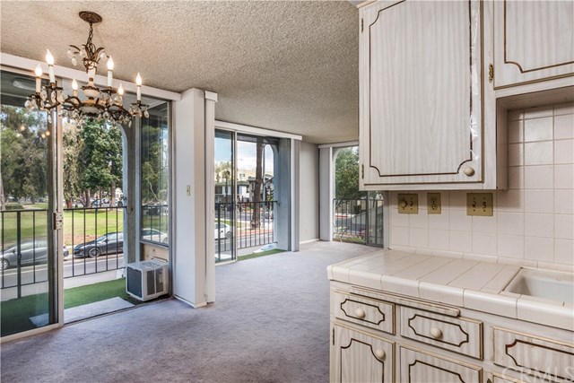 2101 2nd Street, Unit 203 Long Beach, CA 90803 - Photo 11 of 22 kitchen overlooking dining and living room