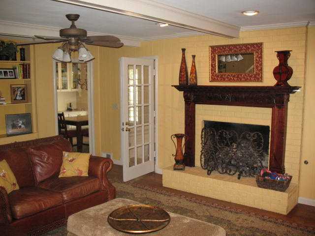 7586 Apple Valley Road Germantown, TN 38138 - Photo 2 of 12 Antique mahogany fireplace in den