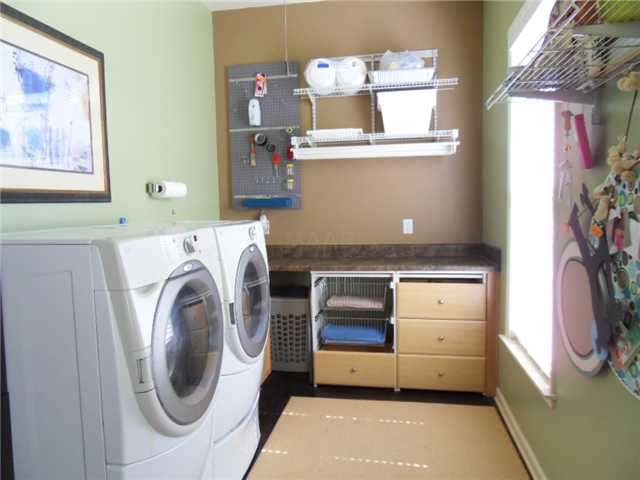 2971 Terry Lane South Road Covington, TN 38019 - Photo 17 of 25 Laundry room with built in organization & deep sink!