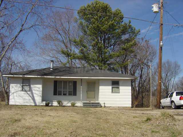 1602 Asbury Glimp Road Ripley, TN 38063 - Photo 1 of 4 Rear view of exterior w/deck