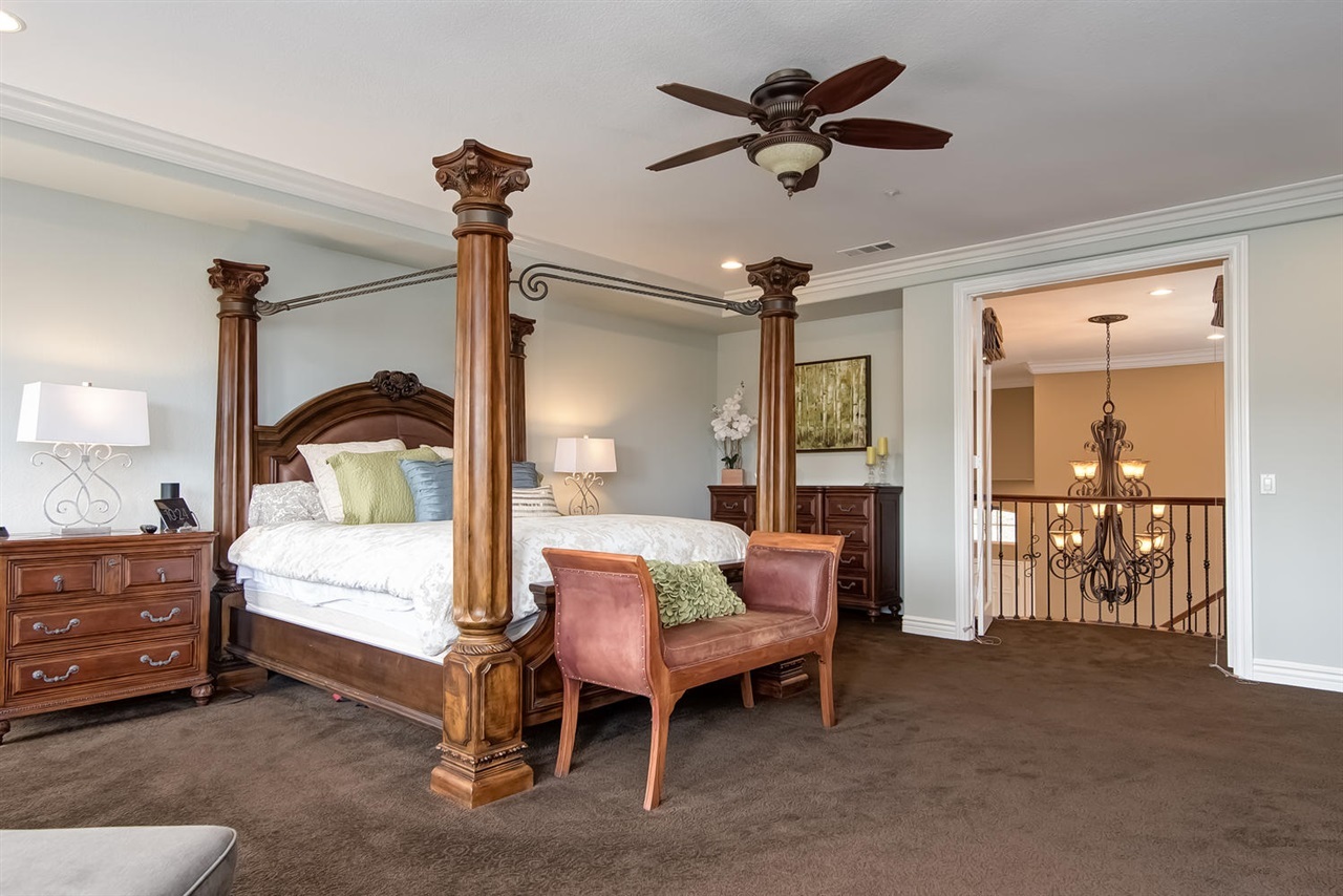 512 Latigo Row Encinitas, CA 92024 - Photo 11 of 25 The upstairs master suite is one-of-a-kind with a dramatic indoor balcony overlooking the first floor, fireplace and large outdoor balcony with expansive views.