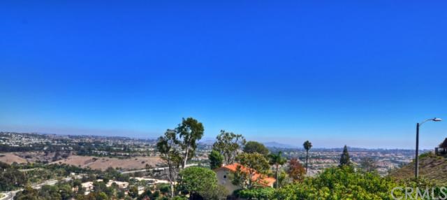 32282 Azores Road Dana Point, CA 92629 - Photo 1 of 1 PHOTOS DONT DO THE VIEW JUSTICE, MOUNTAIN, GOLF COURSE, CITY LIGHT AND SOME OCEAN VIEW.