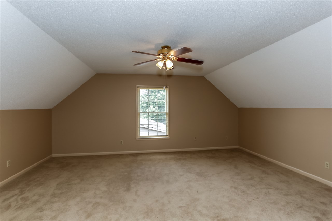 8516 Buckhurst Road Memphis, TN 38016 - Photo 19 of 25 This home offers 3 additional bedrooms, each offering plush carpeting and fresh neutral paint.