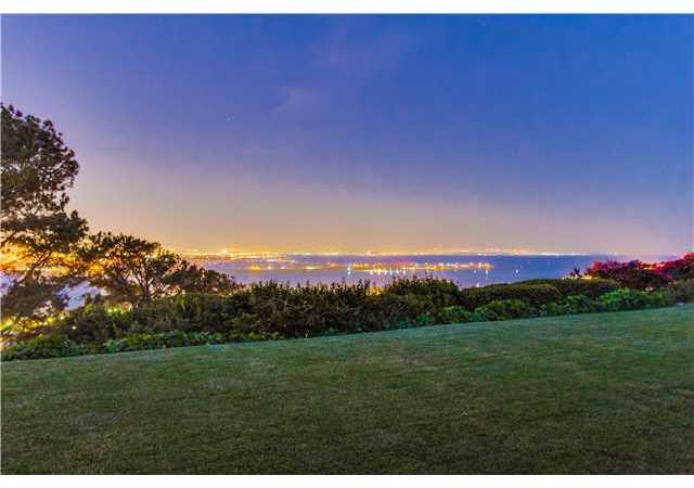 3311 Kellogg Way San Diego, CA 92106 - Photo 10 of 25 looking out the channel of San Diego bay at dusk from the backyard