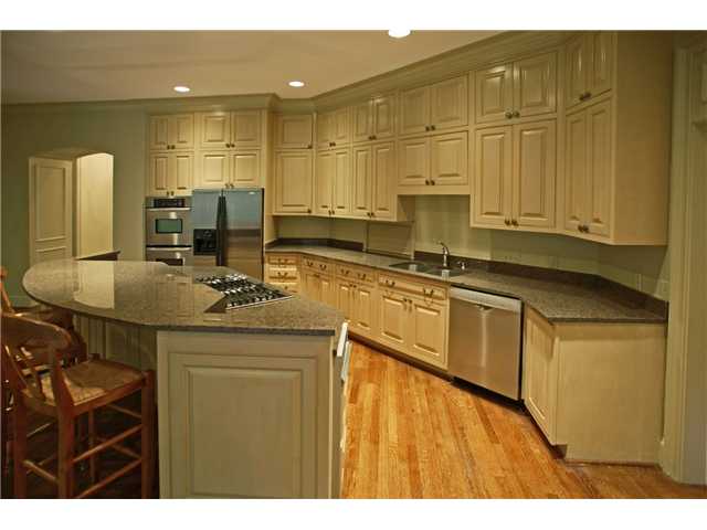 175 Waring Road Memphis, TN 38117 - Photo 7 of 12 New granite and stainless appliances in large, open kitchen.